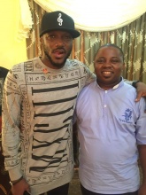 Tuface with Fr. Sixtus Onuh