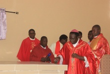 Bishop Matthew Kukah anoints the altar
