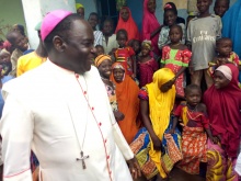 Bishop Kukah visits IDP in Gandi, Donates Relieve Items