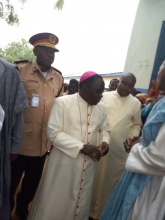 Bishop Kukah visits IDP in Gandi, Donates Relieve Items